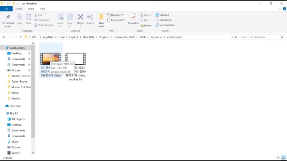 A Windows File Explorer window shows a folder with two video files inside. The address bar at the top shows the folder’s location.