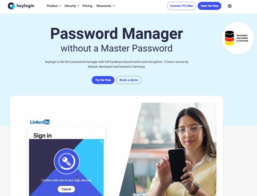 A woman is holding a smartphone and a credit card in front of her laptop. On the laptop screen, you can see the heylogin password manager website and a message asking her to log in to LinkedIn.